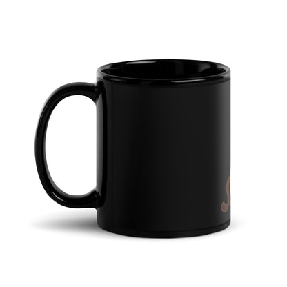 Black glossy mug cat with laptop
