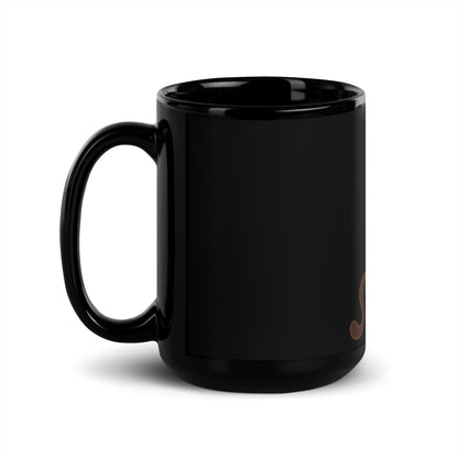 Black glossy mug cat with laptop